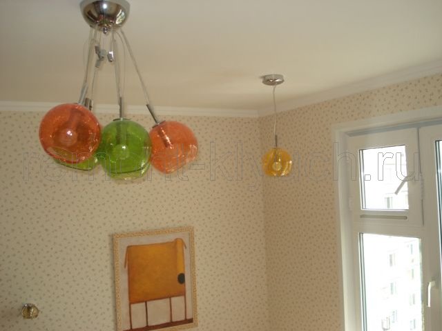 Монтаж пластикого окна, оклеивание стен обоями, навеска потолочных люстр с цветными плафонами в детской комнате