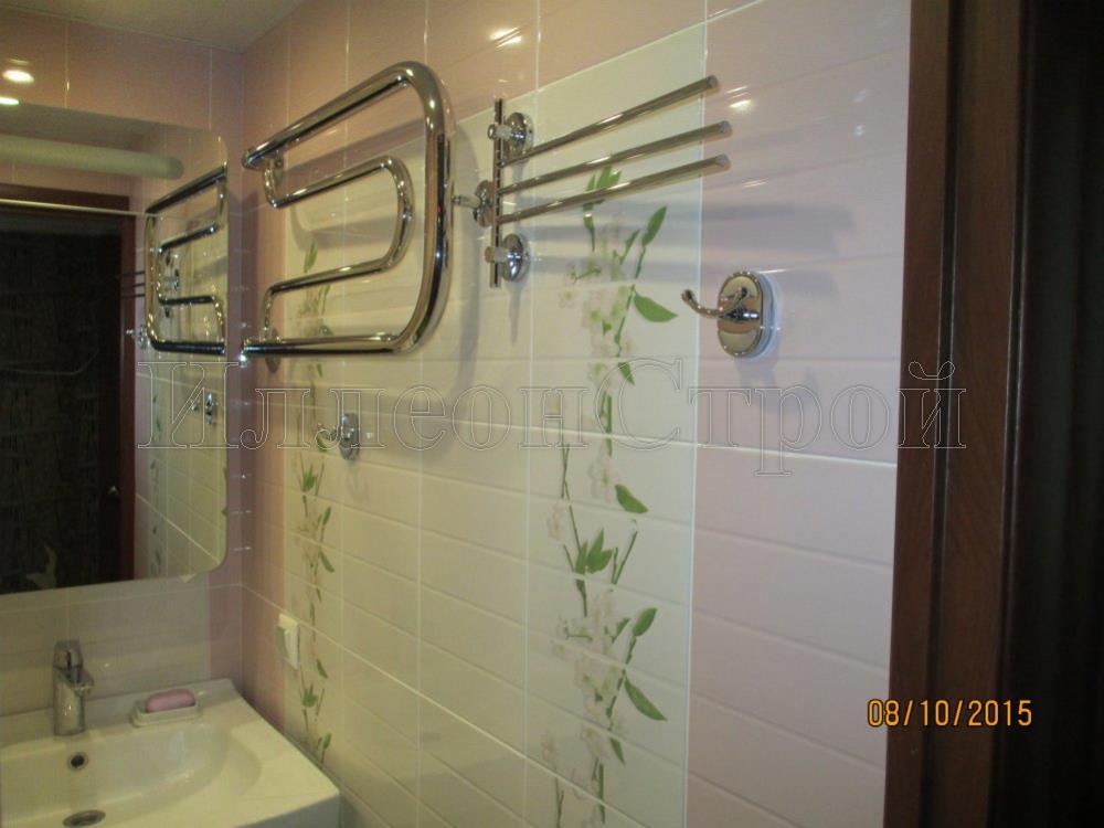 Монтаж полотенцесушителя  в ванной комнате ИллеонСтрой